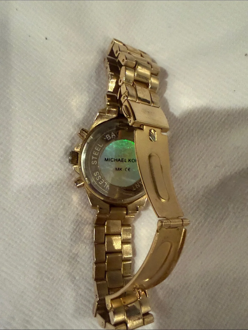 Michael Kors gold tone